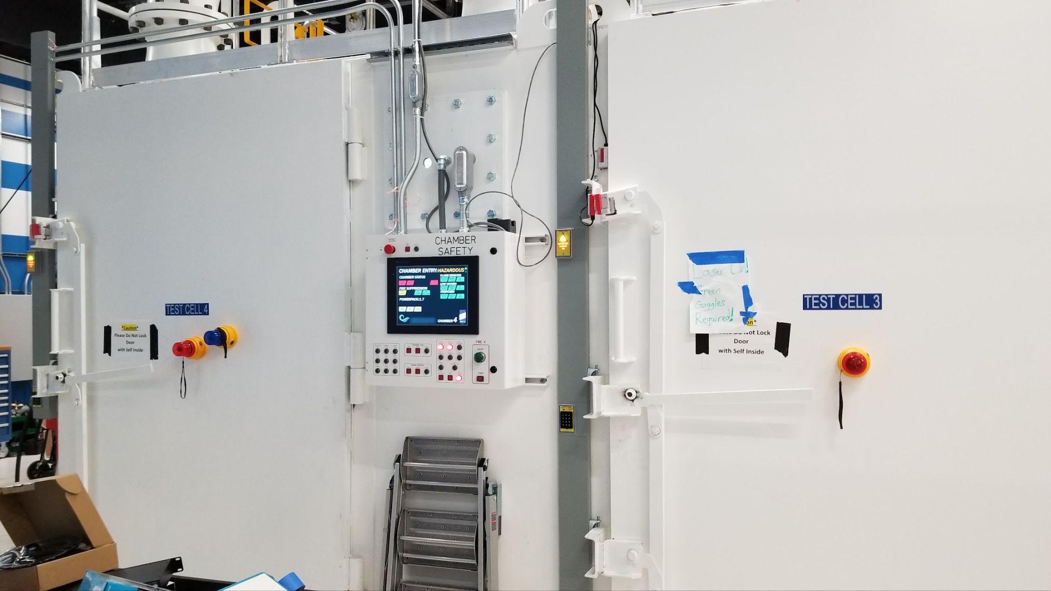 Independent chamber-safety controls, status monitoring, and emergency stops.