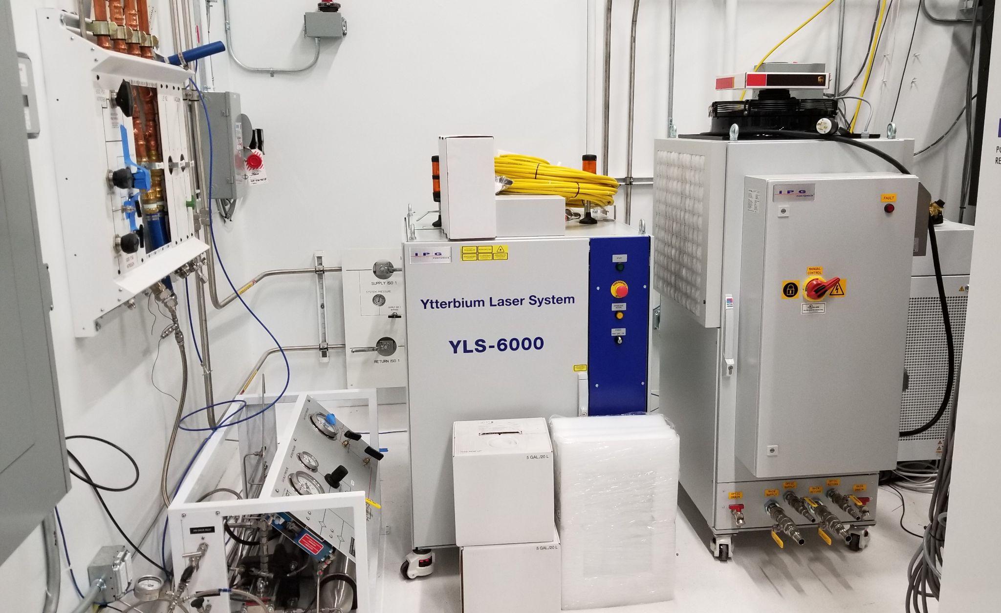 High-power fiber-laser system and supporting equipment.